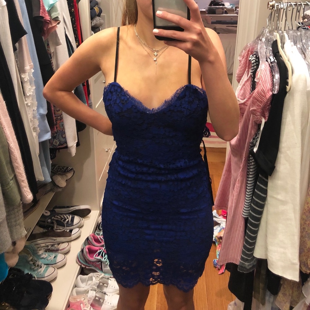 Form-fitting blue lace cocktail dress